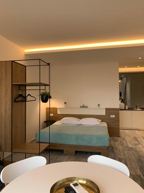 Postel nebo postele na pokoji v ubytování Urban Rooms