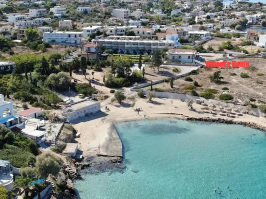 an aerial view of a beach with a body of water at Oinoni's Home - AIAKOS in Souvala