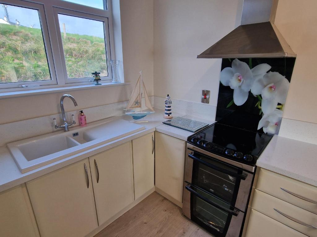 Kuchyň nebo kuchyňský kout v ubytování Beach House