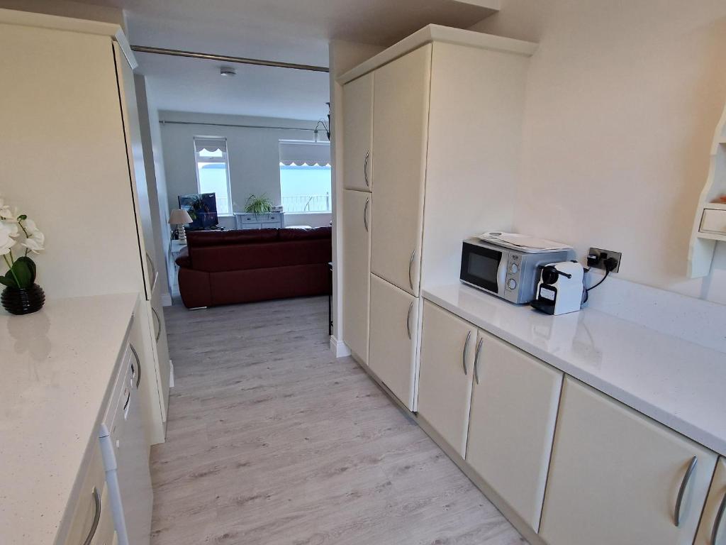 Kuchyň nebo kuchyňský kout v ubytování Beach House