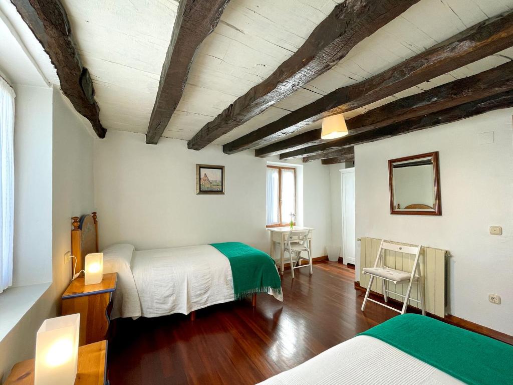 Postel nebo postele na pokoji v ubytování Casa Rural Erreteneko borda
