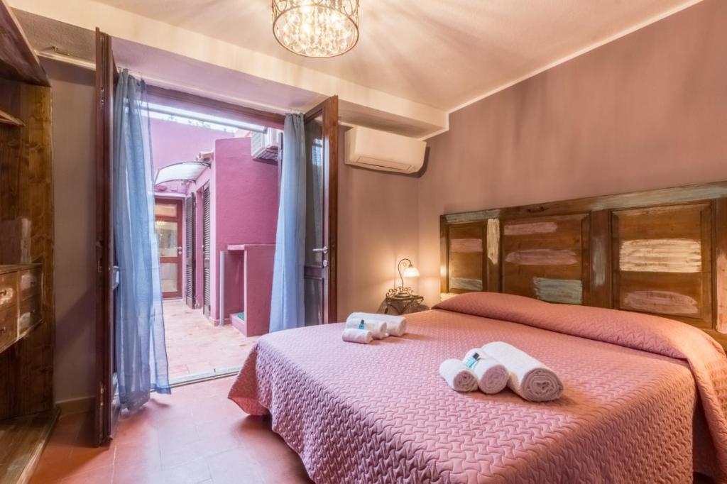 Ένα ή περισσότερα κρεβάτια σε δωμάτιο στο Villa San Lorenzo