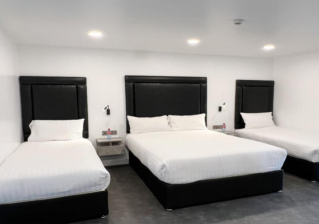 Voodi või voodid majutusasutuse Bella Vista Hotel & Self Catering Suites toas