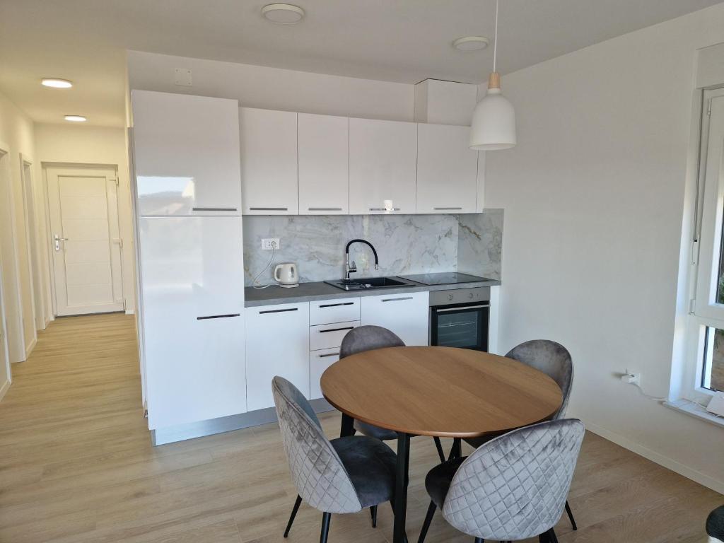 Kuchyňa alebo kuchynka v ubytovaní Providenca Residence