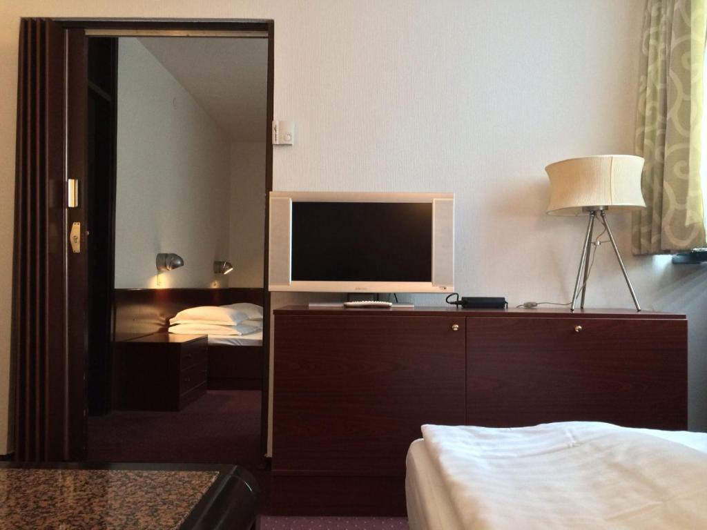 TV a/nebo společenská místnost v ubytování Hotel Laguna Zagreb