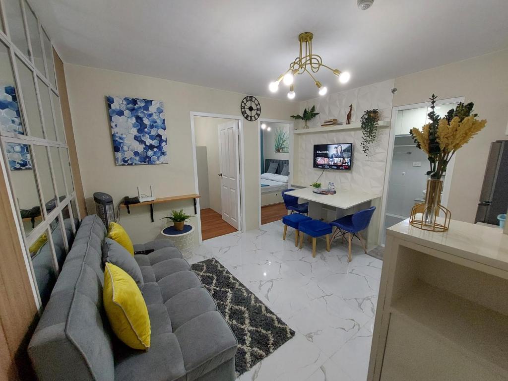 TV a/nebo společenská místnost v ubytování Ann's Condo "2bedroom"