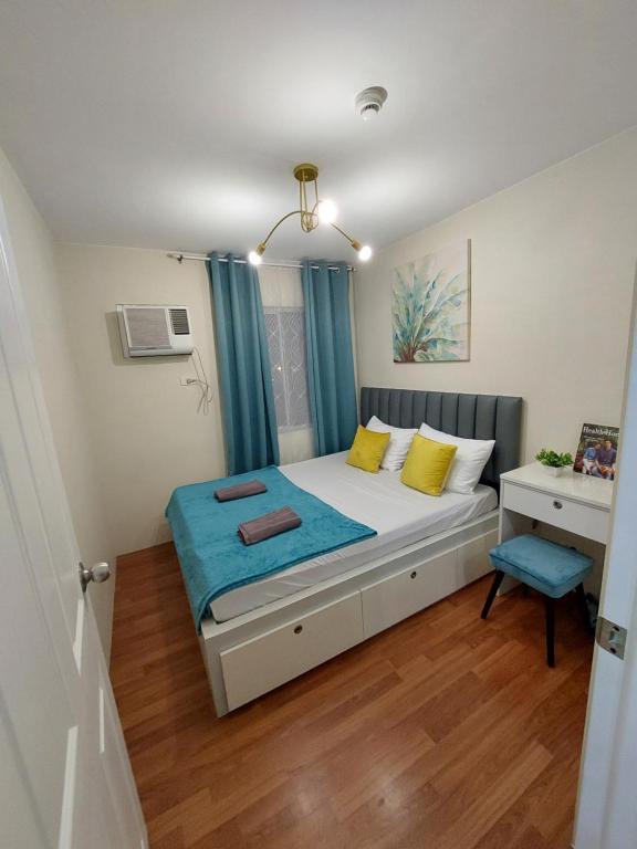 Postel nebo postele na pokoji v ubytování Ann's Condo "2bedroom"