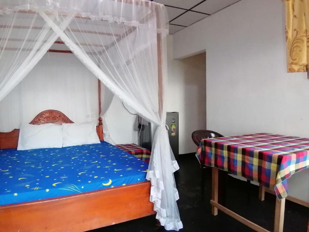 Postel nebo postele na pokoji v ubytování Sasaa Guest House
