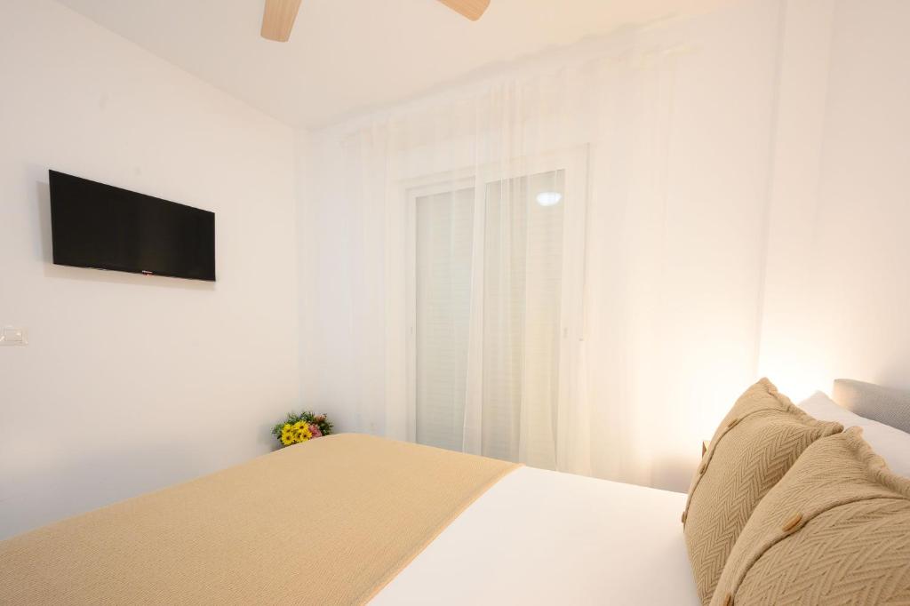Posteľ alebo postele v izbe v ubytovaní New 1 bedroom apartment at 4 min to the beach by 10ToSea