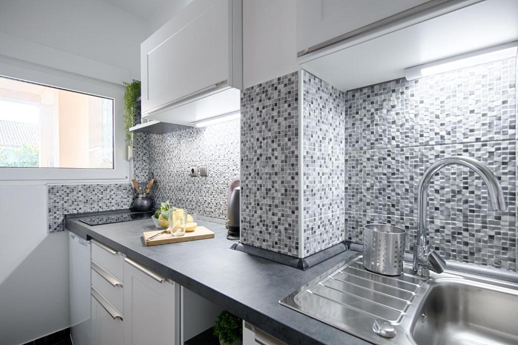 Kuchyň nebo kuchyňský kout v ubytování Apartments Dubra