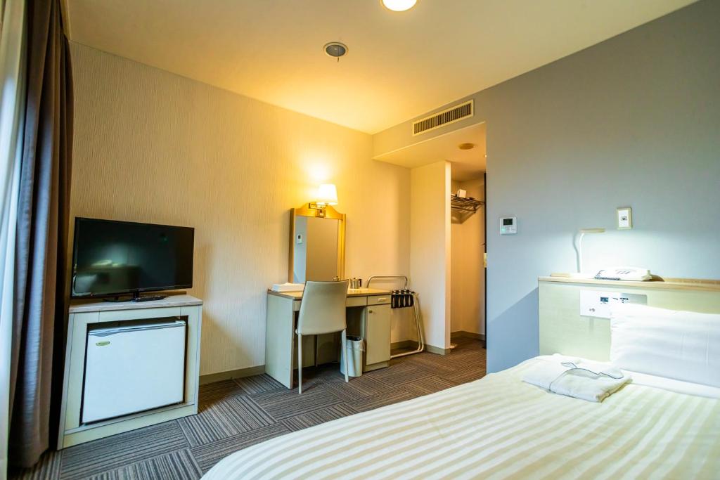 Postel nebo postele na pokoji v ubytování Hotel Sanderson