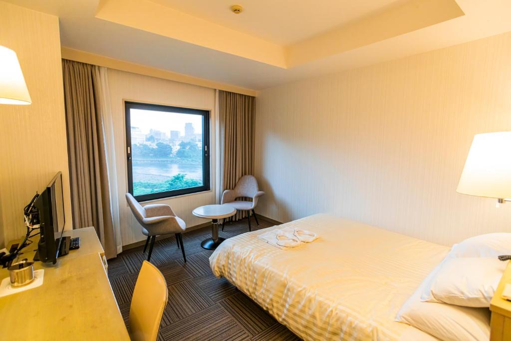 Postel nebo postele na pokoji v ubytování Hotel Sanderson