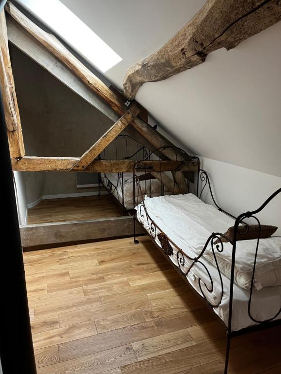 Posteľ alebo postele v izbe v ubytovaní Gîte des 3 Marchands