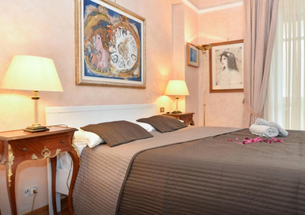 Postel nebo postele na pokoji v ubytování B&B Classy Rome