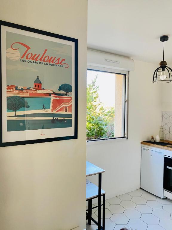Kuchyňa alebo kuchynka v ubytovaní Mon cocoon toulousain cosy appartement idéalement situé