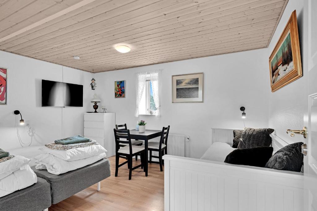 Postel nebo postele na pokoji v ubytování Guldbergs Guesthouse