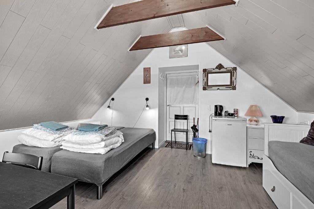Postel nebo postele na pokoji v ubytování Guldbergs Guesthouse