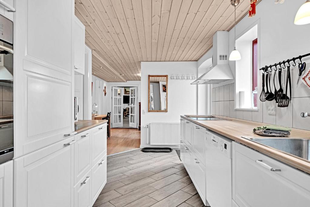Kuchyň nebo kuchyňský kout v ubytování Guldbergs Guesthouse