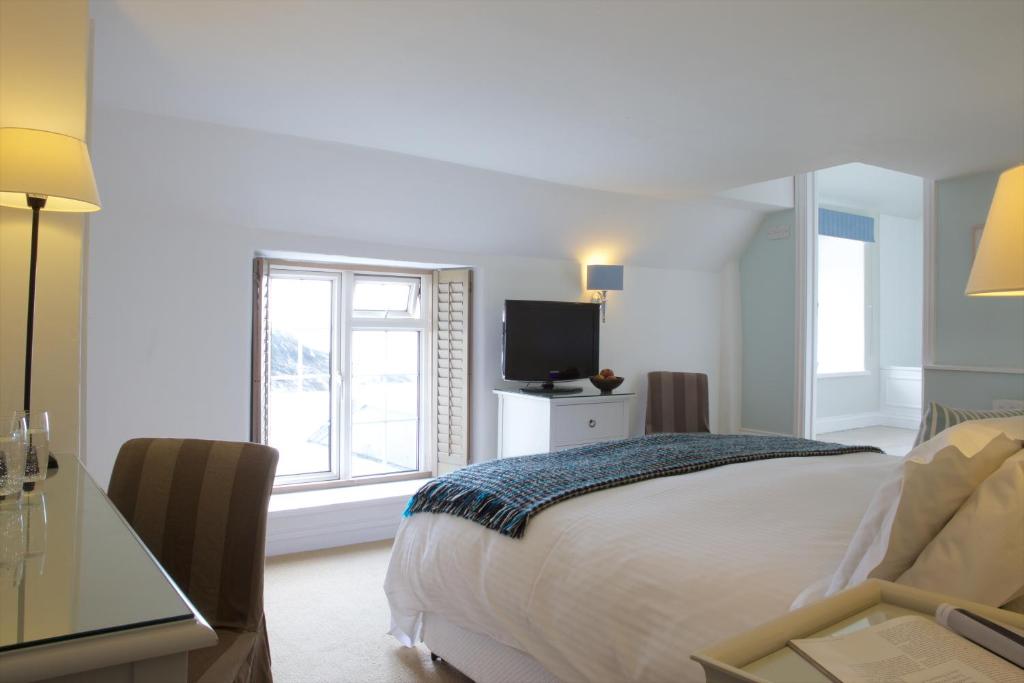 Lugger Hotel ‘A Bespoke Hotel’ - Luxe Tweepersoonskamer Met Uitzicht Op Zee