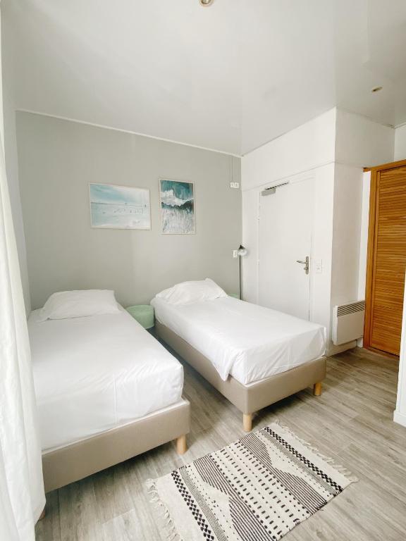 Postel nebo postele na pokoji v ubytování Coliving Biarritz