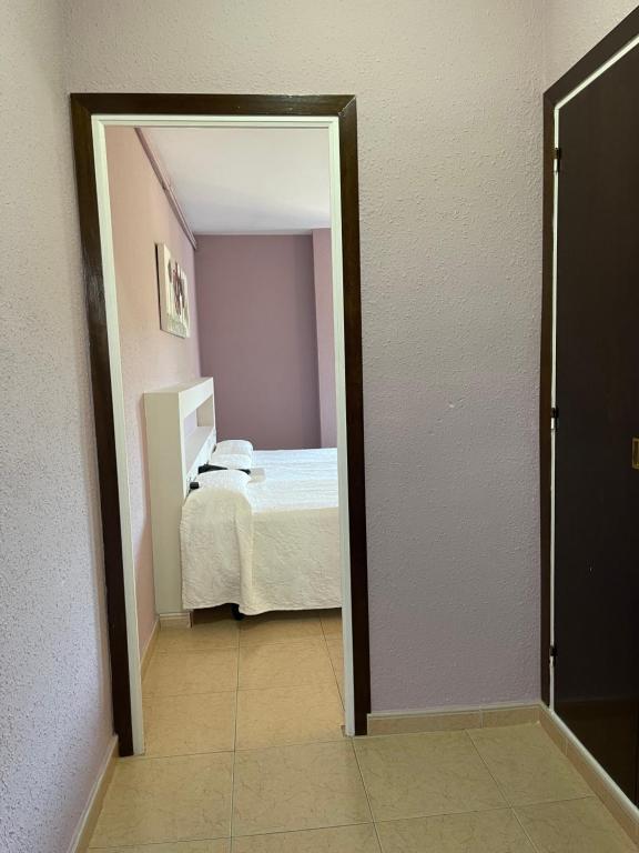 Postel nebo postele na pokoji v ubytování Hotel Bruc