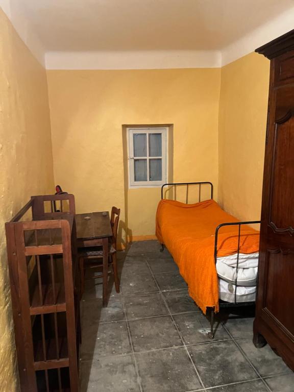 Posteľ alebo postele v izbe v ubytovaní Logement atypique tout en pierre