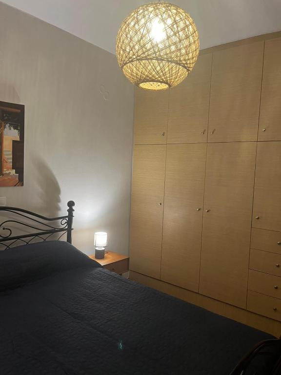 Postel nebo postele na pokoji v ubytování Artemis sunset view apartment