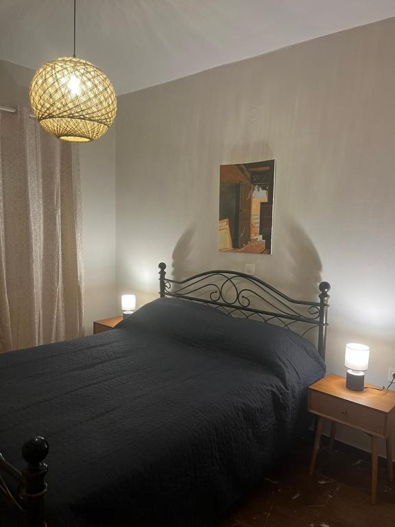 Postel nebo postele na pokoji v ubytování Artemis sunset view apartment