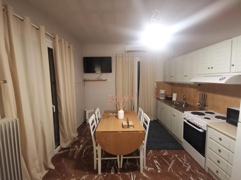 Kuchyň nebo kuchyňský kout v ubytování Artemis sunset view apartment