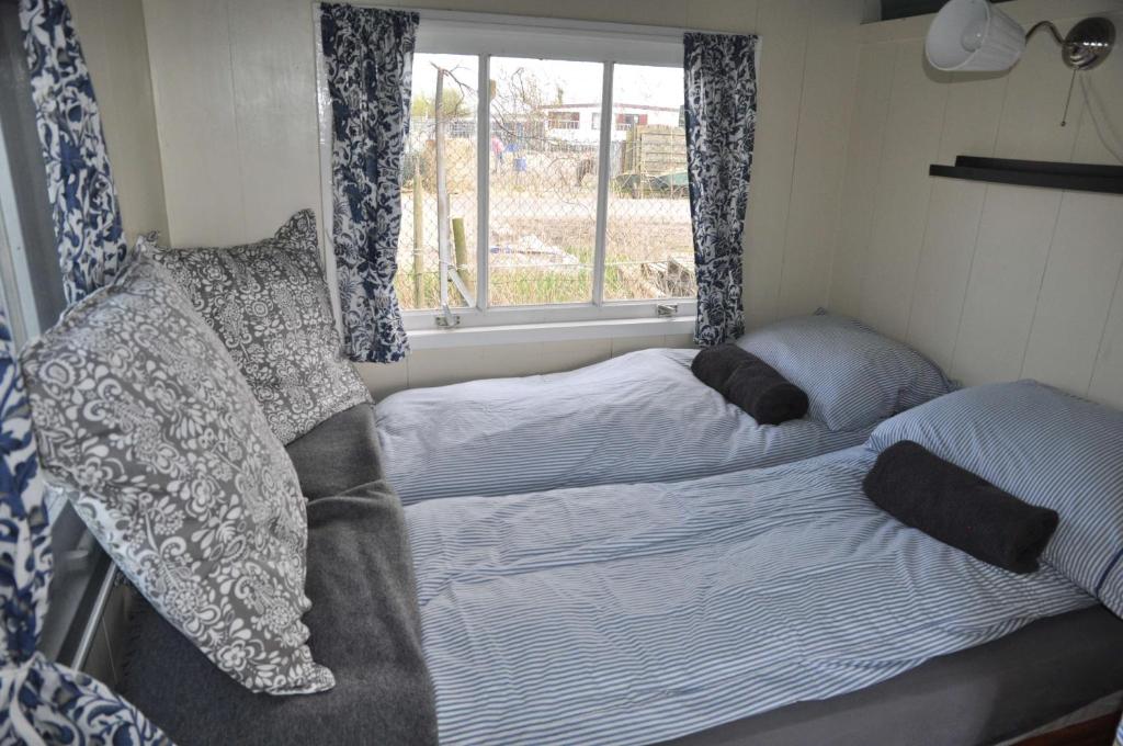 Postel nebo postele na pokoji v ubytování Bed & Breakfast ARKEN AE