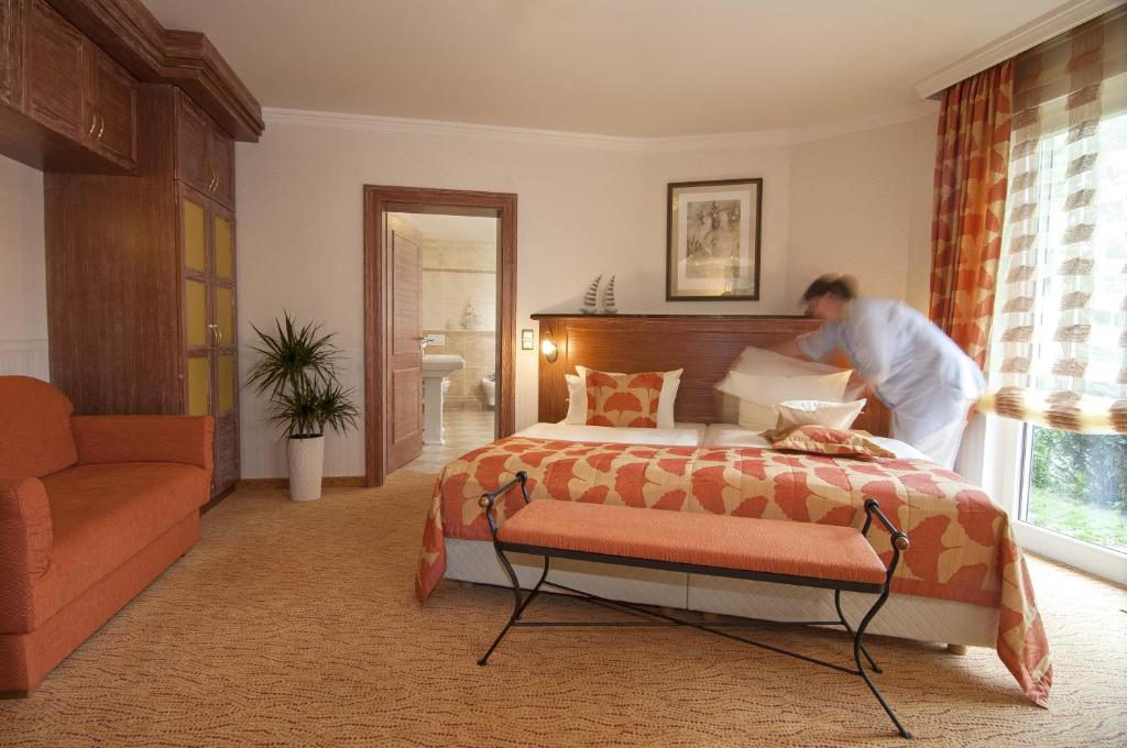Postel nebo postele na pokoji v ubytování Hotel Blinkfüer