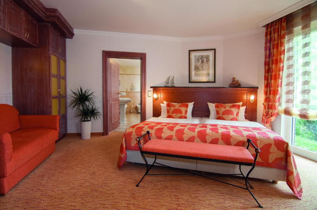 Postel nebo postele na pokoji v ubytování Hotel Blinkfüer