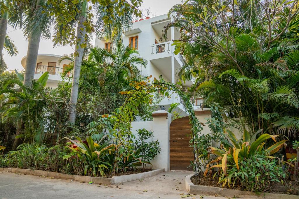 a white building with trees in front of it at Anchorage 42 in Chandīgarh