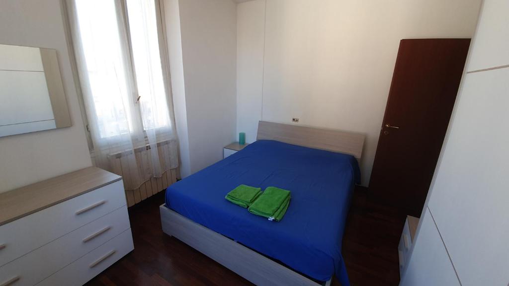Postel nebo postele na pokoji v ubytování Vicolo Verri