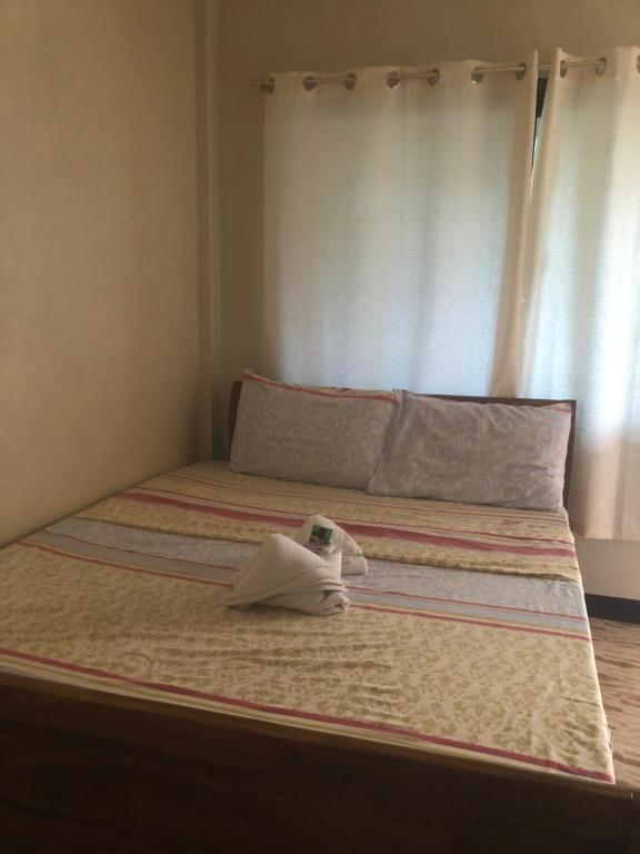 Postel nebo postele na pokoji v ubytování AMK traveller's hub