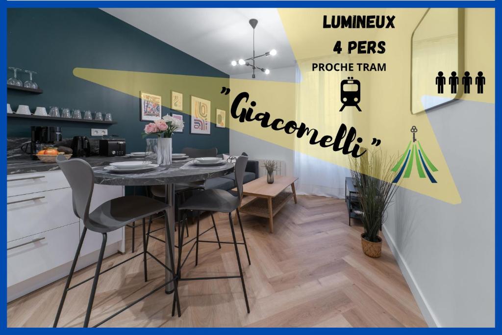 a dining room with a table and chairs in a kitchen at ⟬Giacomelli⟭ Quartier Calme⁕WIFI⁕Proche Michelin⁕ in Clermont-Ferrand