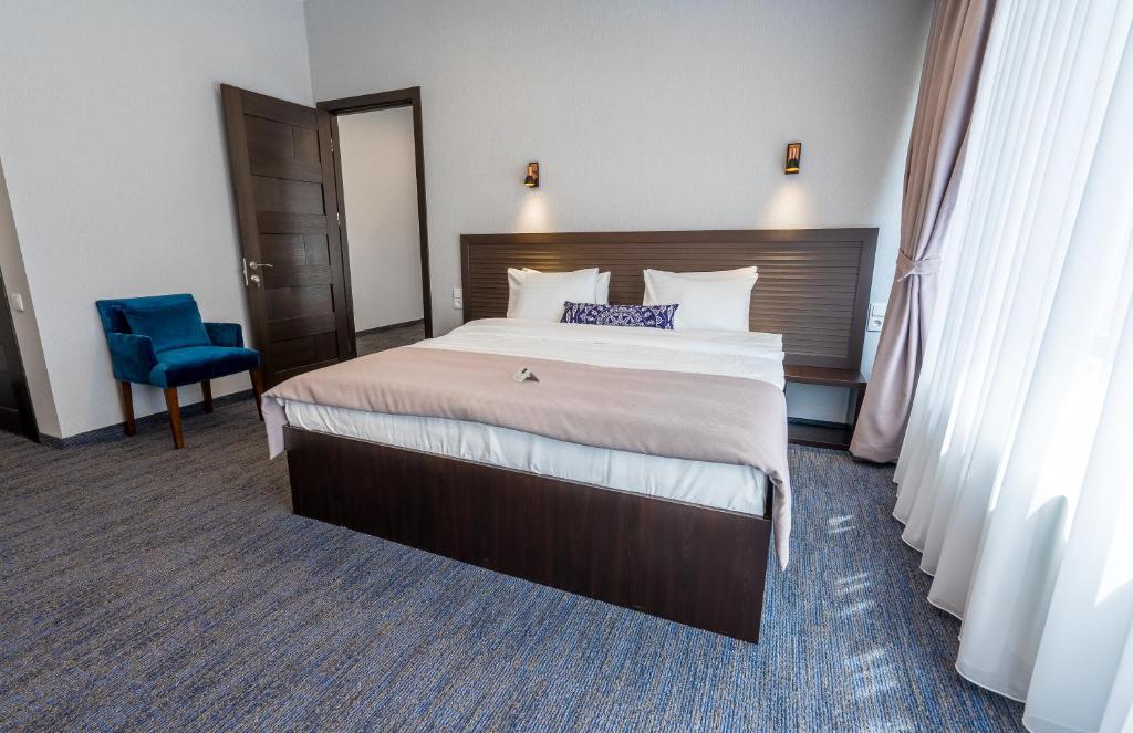 Postel nebo postele na pokoji v ubytování Hotel Bella Casa