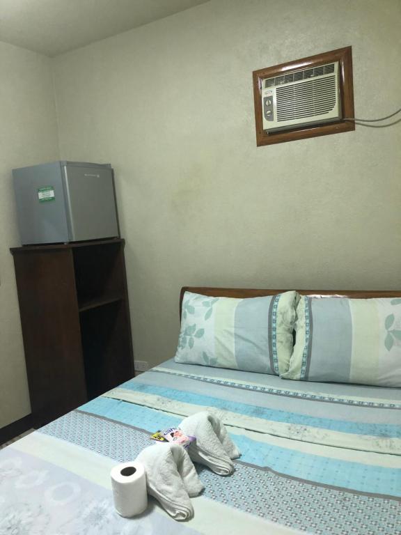 Postel nebo postele na pokoji v ubytování AMK traveller's hub