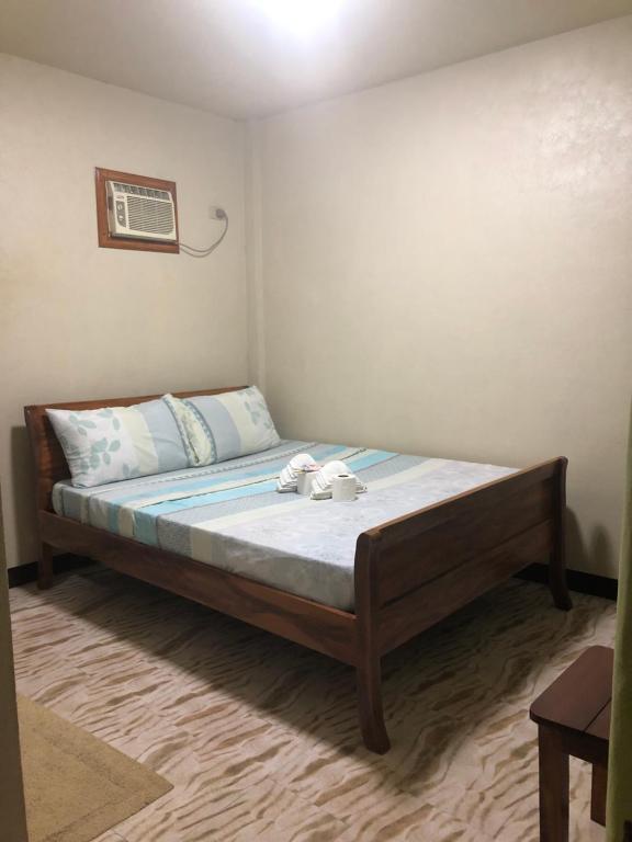 Postel nebo postele na pokoji v ubytování AMK traveller's hub
