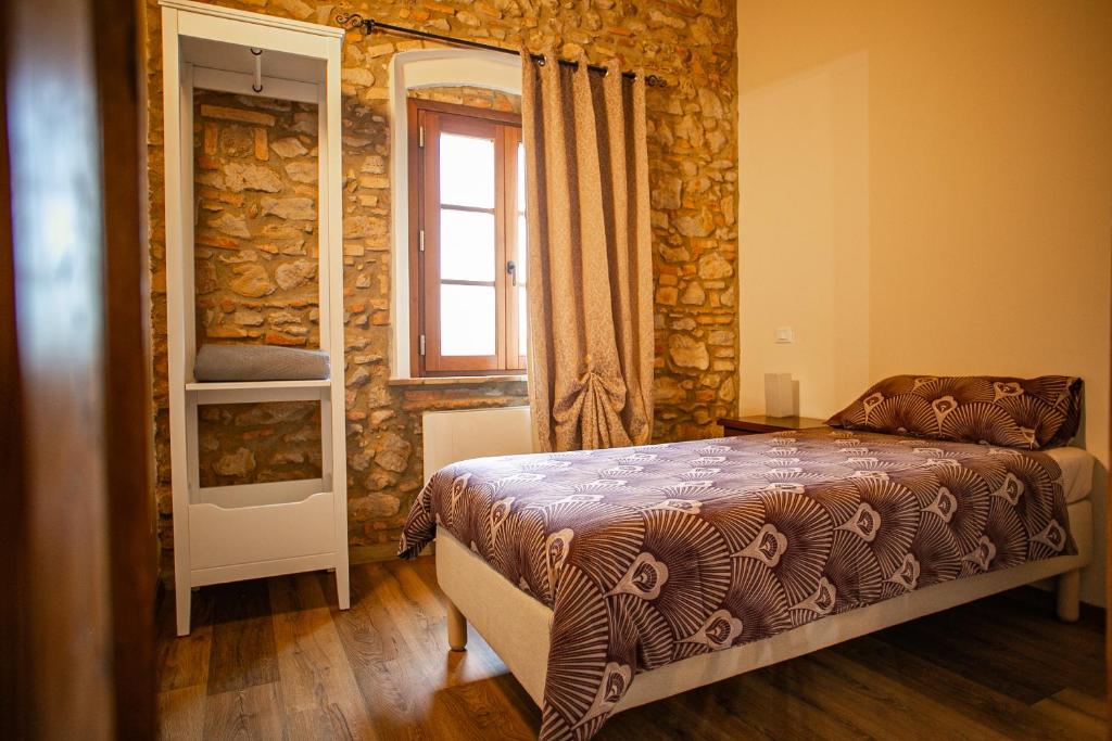 Posteľ alebo postele v izbe v ubytovaní Agriturismo Fonte Belvedere