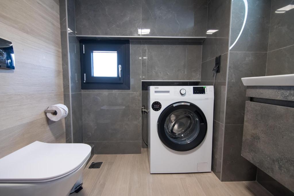 Koupelna v ubytování RAFAELA SUITES