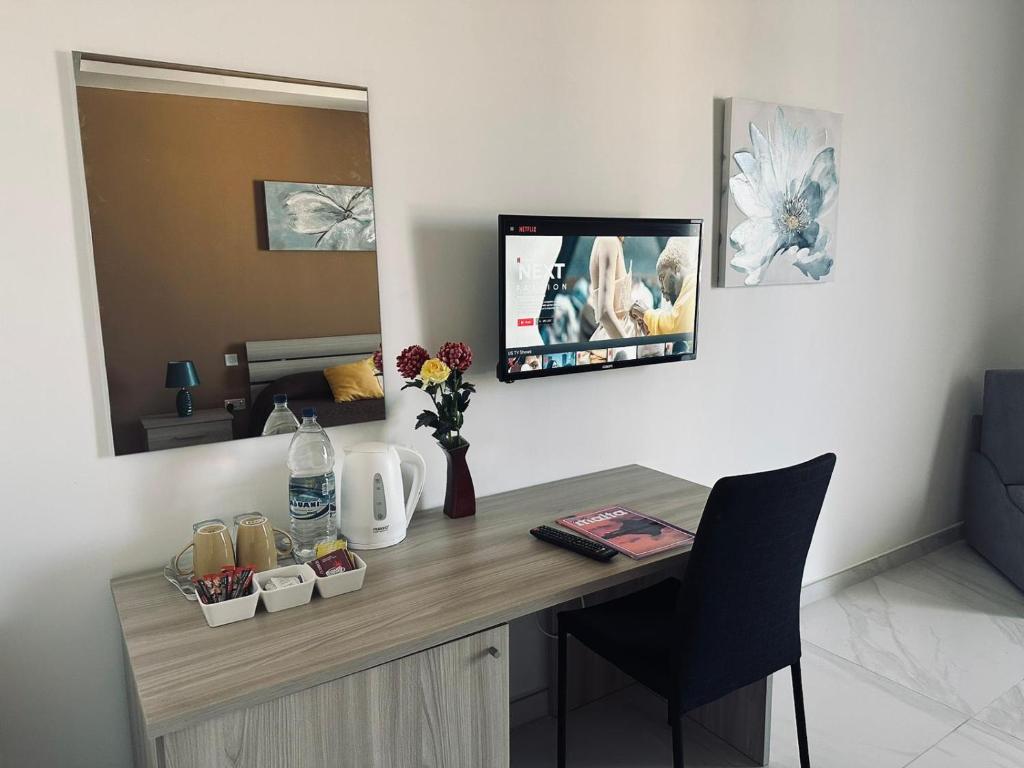 TV a/nebo společenská místnost v ubytování Seaside Accomodation