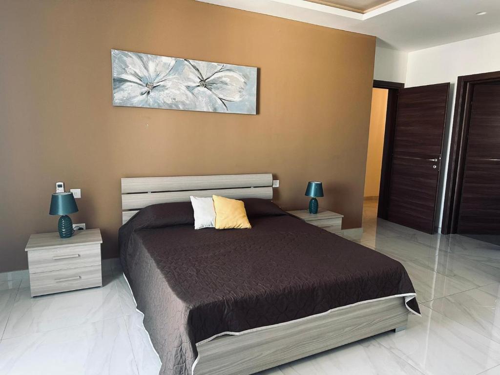 Postel nebo postele na pokoji v ubytování Seaside Accomodation