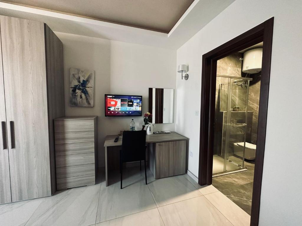 TV a/nebo společenská místnost v ubytování Seaside Accomodation