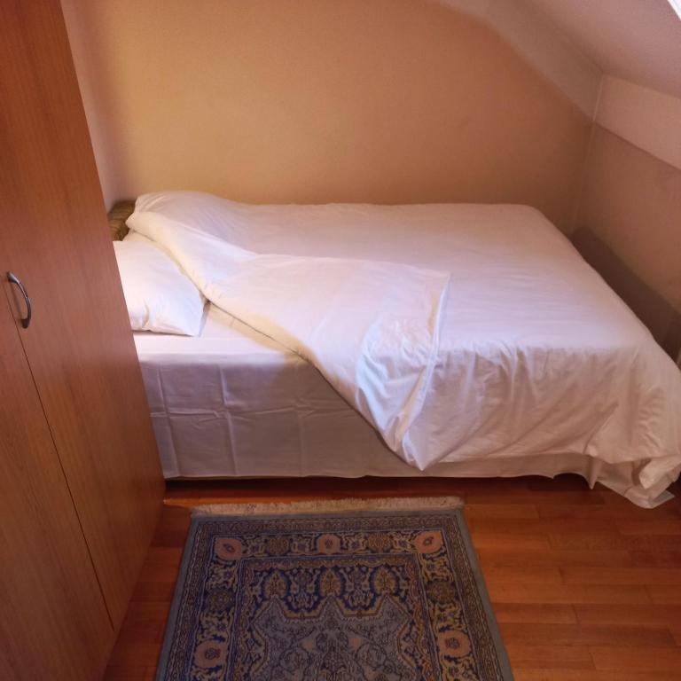 Voodi või voodid majutusasutuse Loli Caffe Apartment toas