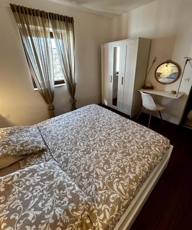 Una cama o camas en una habitación de Elentoni