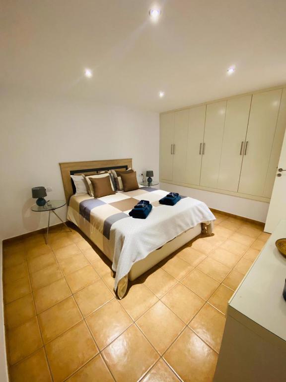 Postel nebo postele na pokoji v ubytování Vivienda Vacacional Naia
