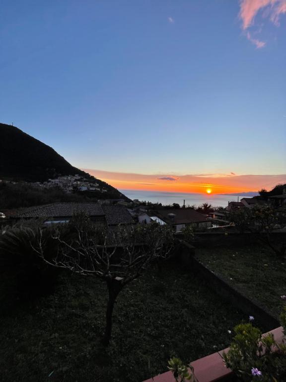 a sunset from the balcony of a house at Casa Vacanze Primavera in Maratea