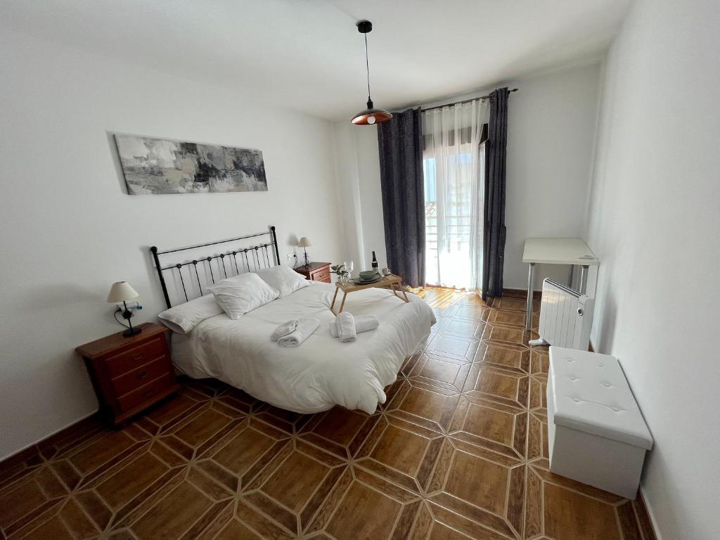 Postel nebo postele na pokoji v ubytování Villa Rangel