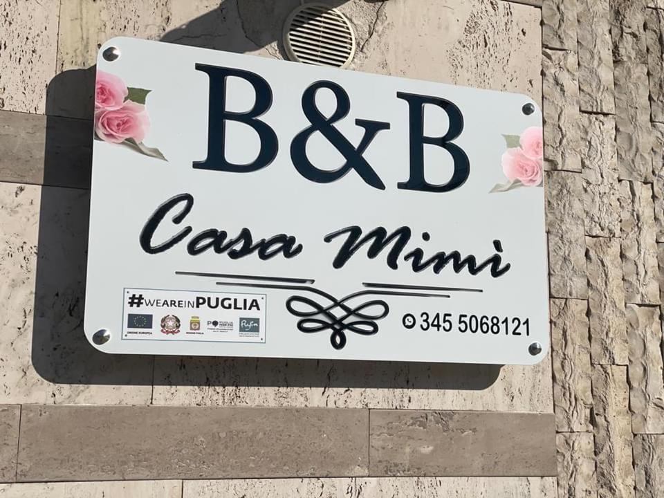 a sign for a b ciao minima restaurant at B&B Casa Mimì in San Ferdinando di Puglia
